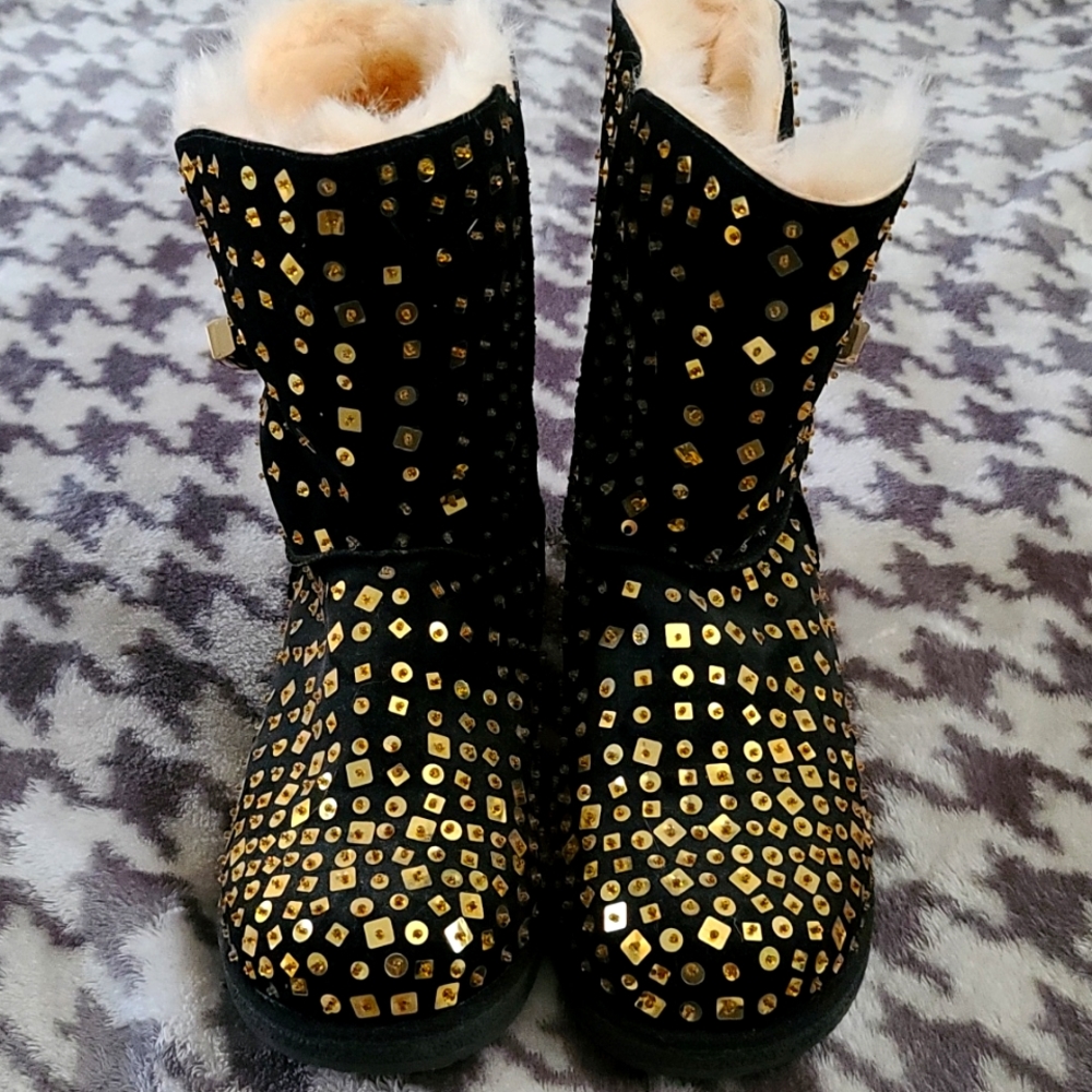 Black and gold boots